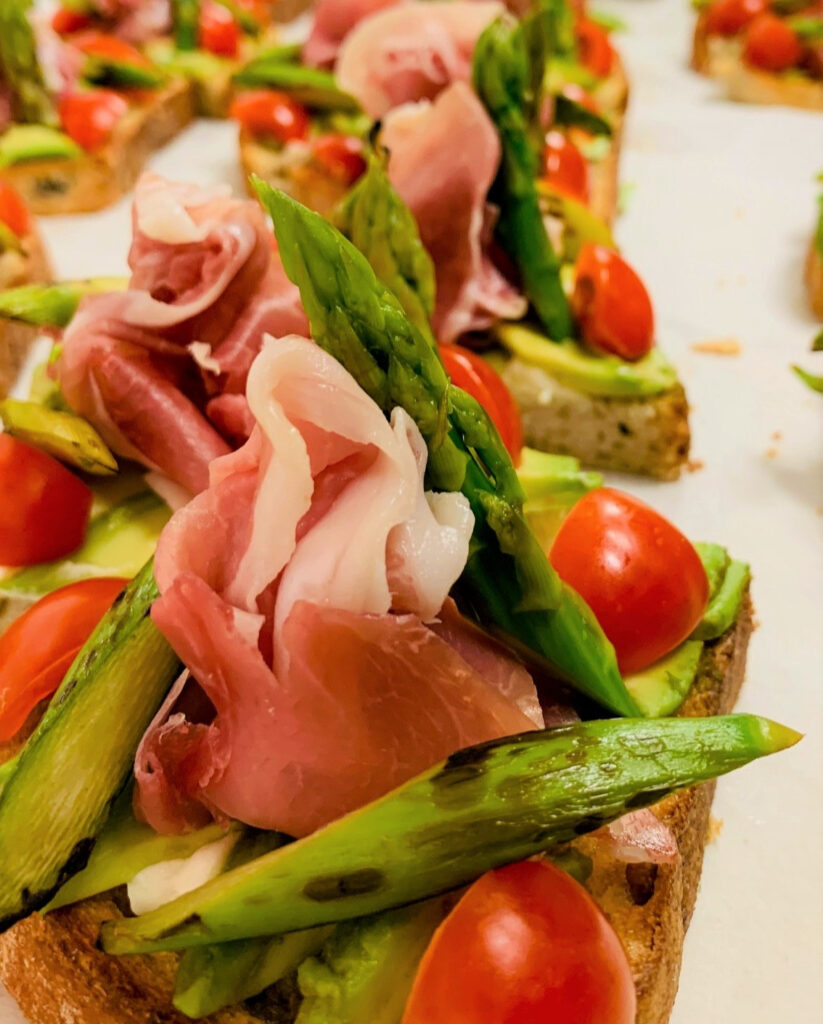 deli meat on bread with vegetables