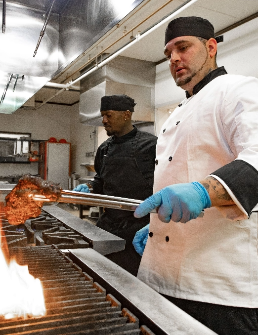 chef grilling chicken
