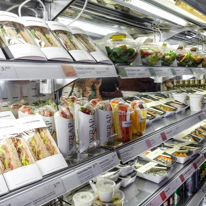 packaged sandwiches and wraps on display in refrigerator